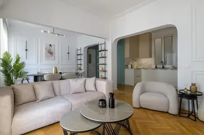 a living room with a couch and a table at Timeless Plaka Retreat in Athens