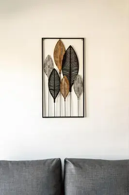 a framed picture of four leaves on a wall at Sunny 3bd flat,Acropolis view in Athens