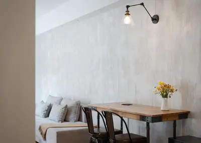 a living room with a table and a couch at Acropolis Atmospheric Apartment in Athens