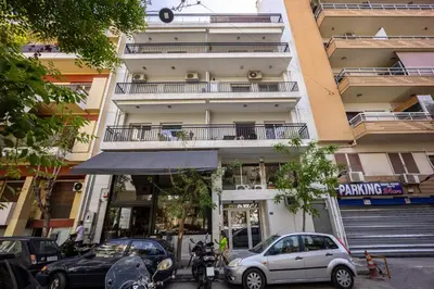 a car parked in front of a building at Marbella Living Pangrati By O&O Group in Athens