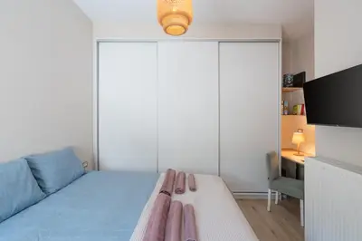 a bedroom with a bed and a couch at The One With The Lemon Tree in Athens