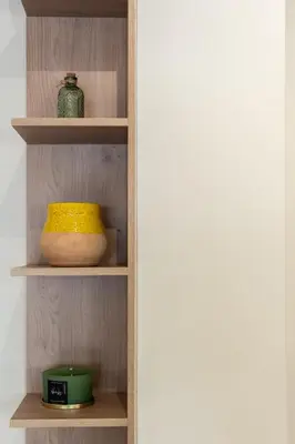 a shelf with a bowl and a vase on it at The One With The Lemon Tree in Athens