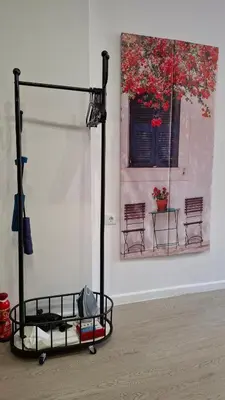a room with a gym equipment in front of a wall at Aiolou street rooms & apartments# in Athens
