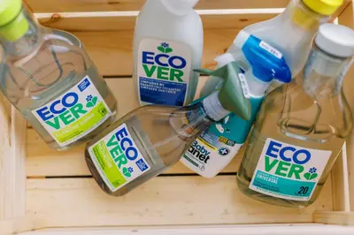 a group of bottles of evo water sitting on a shelf at Cozy 2 Bedroom Apartment Gaia by Philoxenia in Athens