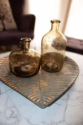 two glass vases sitting on a tray on a table at Athens Central Studios 2 in Athens