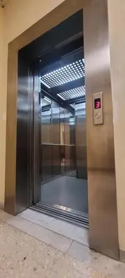 an elevator in a building with its door open at Athens Central Studios 2 in Athens