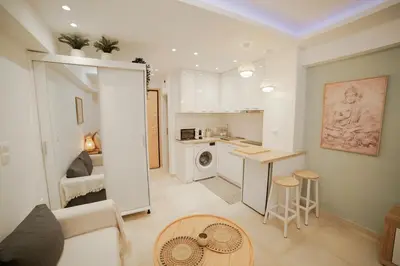 a room with a kitchen and a living room at Luxury&Zen DownTown Apartment by MPS in Athens