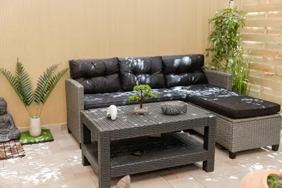 a living room with a couch and a table at Luxury&Zen DownTown Apartment by MPS in Athens