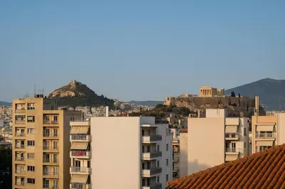 a view of a city with tall buildings at Apartment for 4 with Acropolis view - Athens 5km Piraeus 5km Metro 5' walk in Piraeus