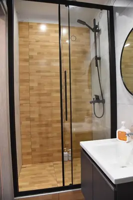 a bathroom with a shower and a sink at Aiolou street rooms 2& apartments in Athens