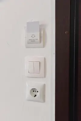 a white wall with a box on a wall at Aiolou street rooms 2& apartments in Athens