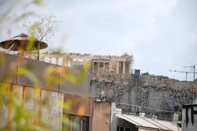 a view of an old building on top at mylo akropoli views in Athens
