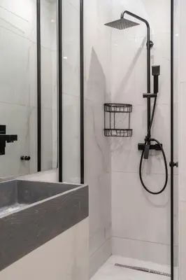 a bathroom with a shower and a sink at Ilisia Urban Elegance in Athens