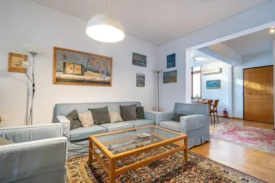 a living room with a couch and a coffee table at 3BRM Flat in Chalandri - Near Metro by ΜΡS in Athens