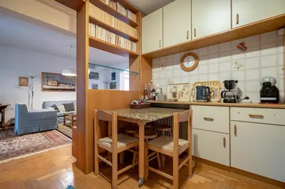 a kitchen with a table and chairs in a room at 3BRM Flat in Chalandri - Near Metro by ΜΡS in Athens