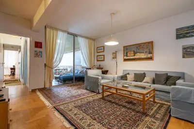 a living room with a couch and a coffee table at 3BRM Flat in Chalandri - Near Metro by ΜΡS in Athens