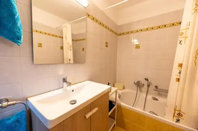a bathroom with a sink and a bath tub at Artemis Riviera Near Athen's Airport By SEM in Artemida