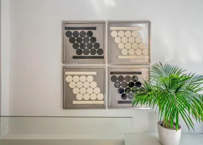 a potted plant sitting on a table next to a wall at Athens Design Residence in Athens