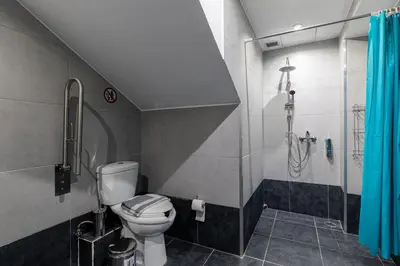 a bathroom with a toilet and a shower at Nobia 1 in Athens