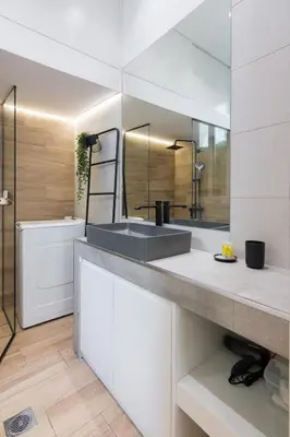 a bathroom with a sink and a mirror at Unique Apartment Ideal for Couples in Piraeus