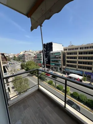 a balcony with a view of a city street at Μοντέρνο στούντιο στην Καλλιθέα in Athens