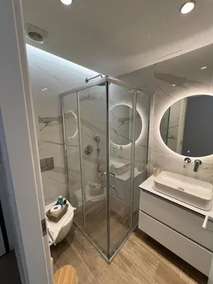 a bathroom with a shower and a sink at Luxury Apartment in Athens in Athens
