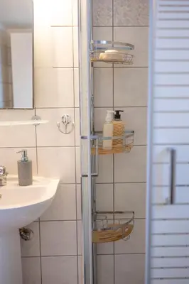 a bathroom with a sink and a mirror at VK Athens Center in Athens