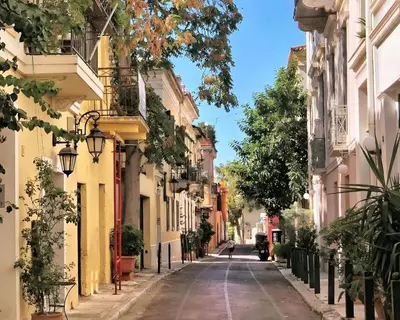 an empty street in a city with buildings at Whole Apartment 52 square meters in the neigboor of Pagrati in Athens in Athens