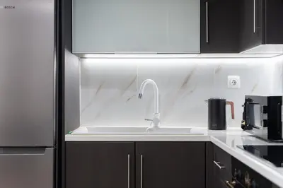 a kitchen with a sink and a counter top at LIV - Relaxing Pagrati Retreat in Athens in Athens