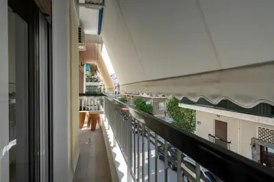a balcony with a view of a building at LIV - Relaxing Pagrati Retreat in Athens in Athens