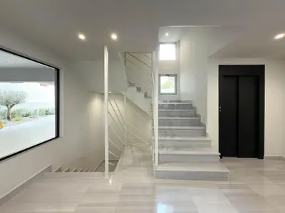 a staircase in a house with a black door at Airrent Apartments 1 The Athens Jacuzzi Lounge in Athens