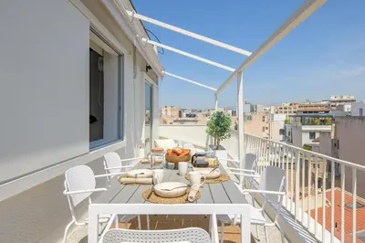 a balcony with a table and chairs on a balcony at Acropolis Dream with Plunge Pool in Athens