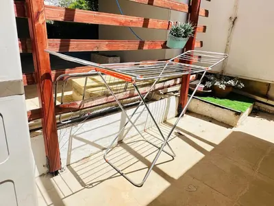 a metal object sitting on the side of a building at Zoy's house in Athens