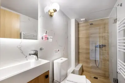 a bathroom with a toilet and a sink and a shower at Andromeda - 1 Bedroom Apt & Terrace in Athens in Athens