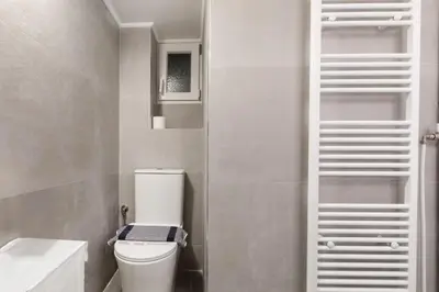 a small bathroom with a toilet and a sink at Les Nuances de Bleu - 1-Bedroom & Balcony in Athens in Athens