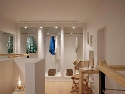 a room with a store with clothes on display at Athens Cycladic Hideaway in Athens