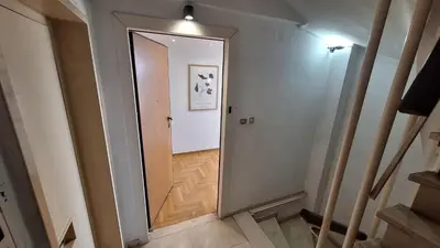 a hallway with a door leading into a room at Vip Panoramic view in Athens