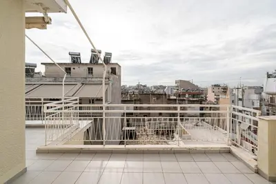 a balcony with a view of a city at Azotea Con Vista Athens in Athens