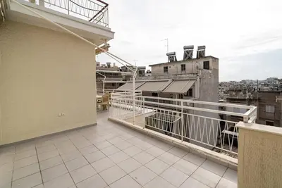 an apartment balcony with a view of a city at Azotea Con Vista Athens in Athens