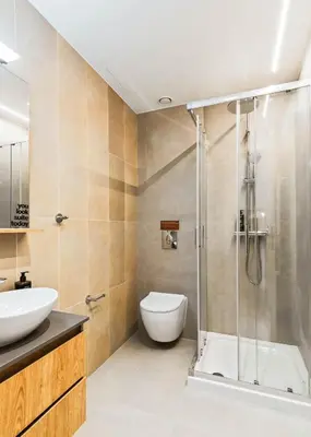 a bathroom with a shower and a toilet at Limehome Piraeus Iris in Piraeus