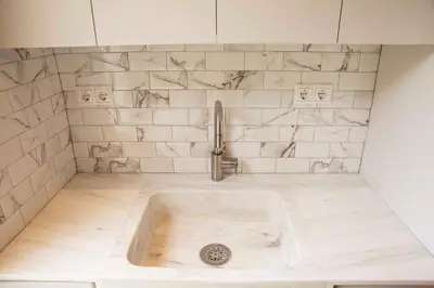 a bathroom with a shower with a sink at Contemporary Athenian Escape GHH in Athens