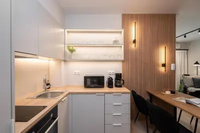 a kitchen with a sink and a counter top at Modern Apartment in Athens with Balcony in Athens