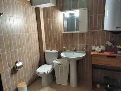 a bathroom with a toilet and a sink at Charming Flat in Central Athens in Athens
