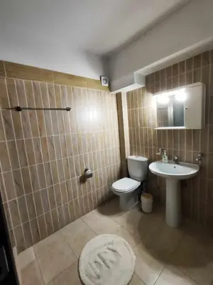 a bathroom with a toilet and a sink at Charming Flat in Central Athens in Athens