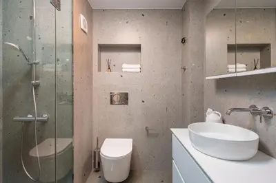 a bathroom with a shower and a sink and a toilet at Stylish Retreat in Quiet Piraeus Newly Renovated in Piraeus