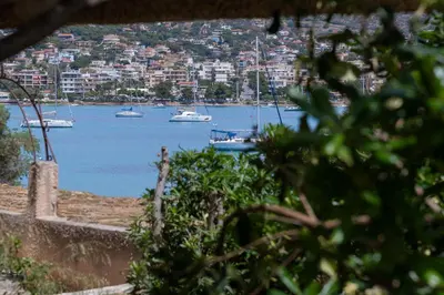 a view of a harbor with boats in the water at Stef's Place Porto Rafti in Porto Rafti