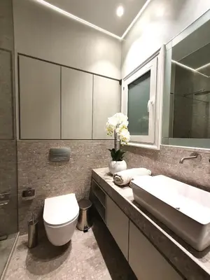 a bathroom with a toilet and a sink at Art Gallery Apartment in Athens