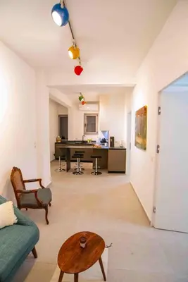 a living room with a couch and a table at Smoothie 2Bdr City Center Flat in Athens