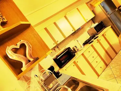 an overhead view of a kitchen with a stove top oven at Cozy & Connected in Athens