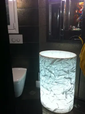 a bathroom with a vase in the middle of a sink at MARGARITAS' SUITES viktoria square in Athens